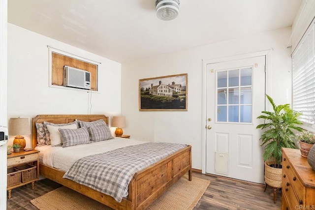 bedroom featuring dark wood-type flooring