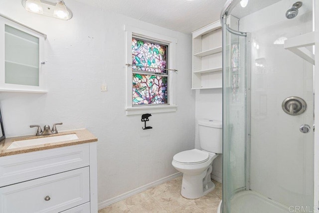 bathroom featuring vanity, walk in shower, a textured ceiling, toilet, and tile patterned floors