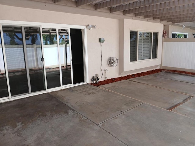 doorway to property featuring a patio