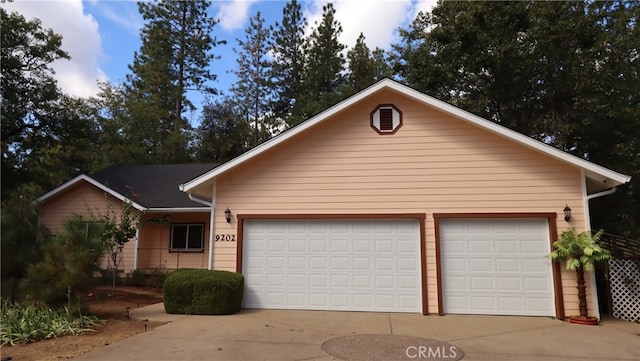 ranch-style home with a garage