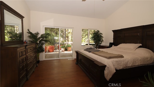 bedroom featuring lofted ceiling, ceiling fan, access to exterior, and dark hardwood / wood-style flooring