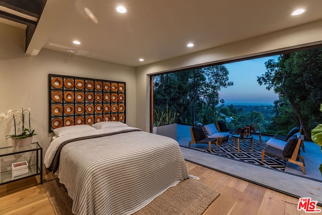 bedroom featuring light hardwood / wood-style floors