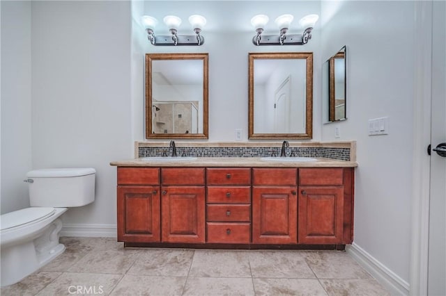 bathroom with tasteful backsplash, an enclosed shower, vanity, tile patterned flooring, and toilet