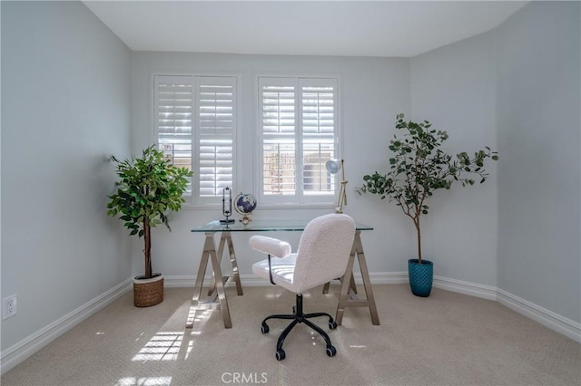 office area with light colored carpet