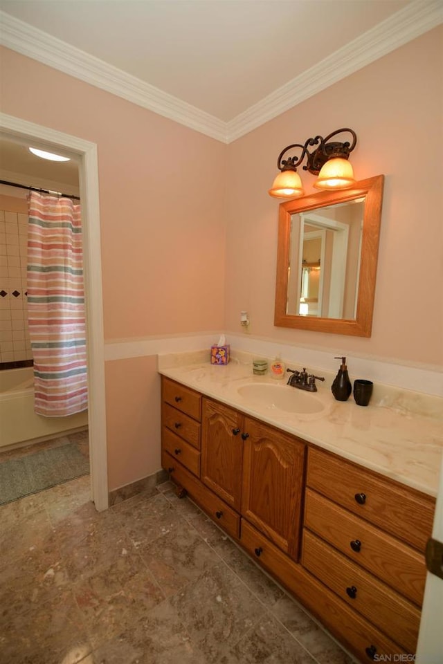 bathroom featuring ornamental molding, shower / tub combo with curtain, and vanity