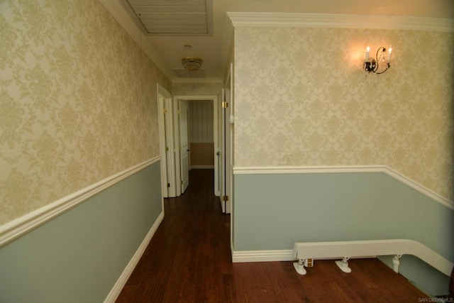 hall featuring crown molding and dark hardwood / wood-style floors