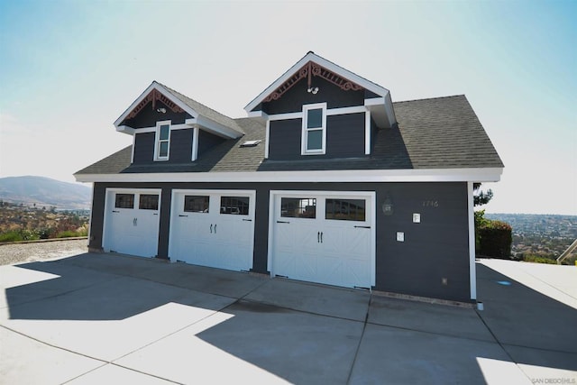 garage featuring a mountain view