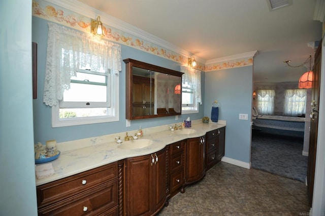 bathroom with vanity and crown molding