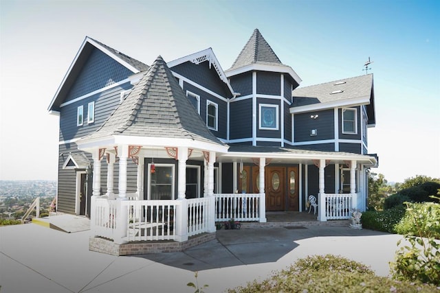 victorian-style house with a porch