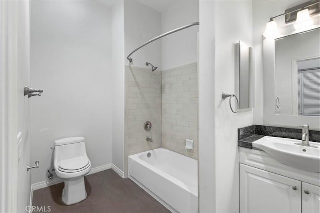 full bathroom featuring vanity, toilet, and tiled shower / bath