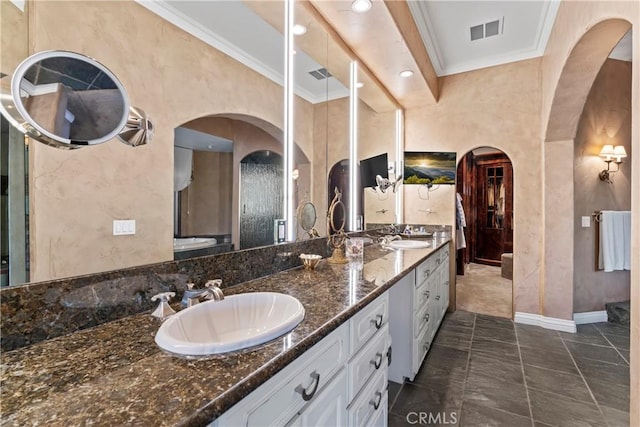 bathroom with vanity and ornamental molding