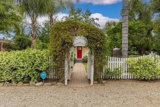 view of property hidden behind natural elements