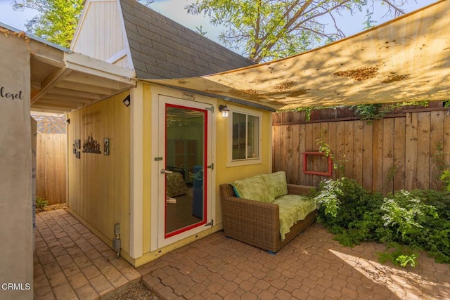 view of patio / terrace featuring fence