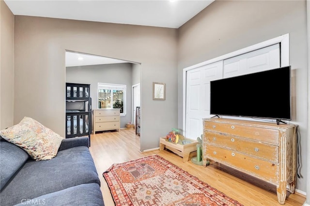 1169 Aztec, Topanga, CA 90290 - living area with light wood finished floors and baseboards