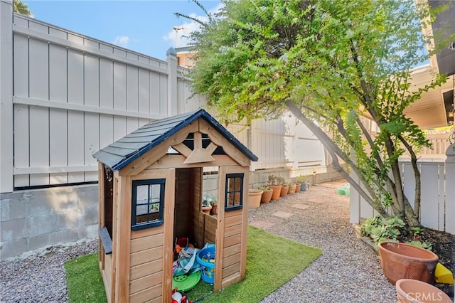 1169 Aztec, Topanga, CA 90290 - view of outdoor structure with a fenced backyard