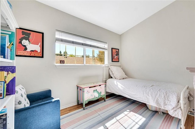 1169 Aztec, Topanga, CA 90290 - bedroom featuring baseboards and wood finished floors