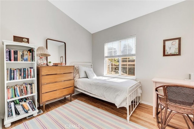 1169 Aztec, Topanga, CA 90290 - bedroom with wood finished floors, lofted ceiling, and baseboards