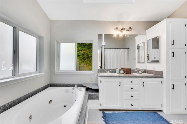 1169 Aztec, Topanga, CA 90290 - full bathroom featuring double vanity, a tub with jets, and tile patterned floors