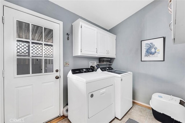 1169 Aztec, Topanga, CA 90290 - washroom with washer and clothes dryer, cabinet space, baseboards, and light tile patterned floors