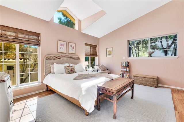 1169 Aztec, Topanga, CA 90290 - bedroom featuring baseboards, light wood finished floors, and high vaulted ceiling
