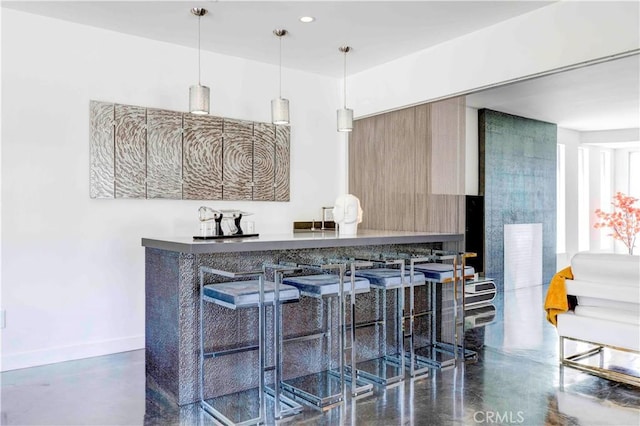 bar featuring pendant lighting