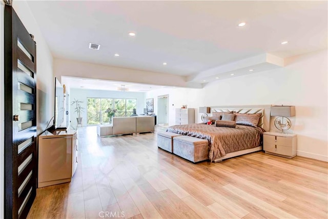 bedroom with light hardwood / wood-style flooring