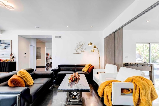 living room featuring dark hardwood / wood-style floors