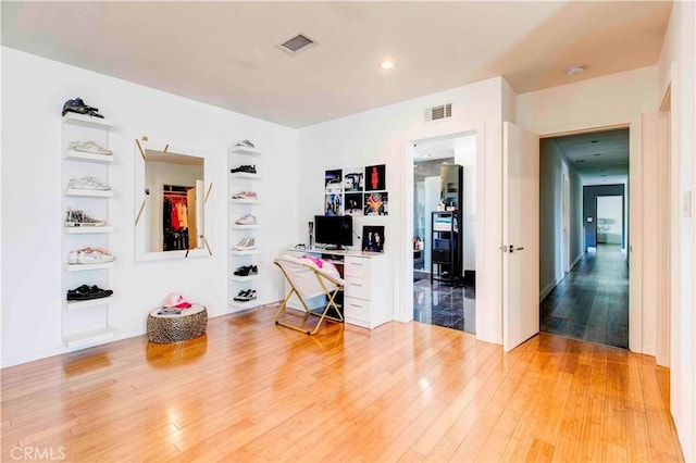 interior space with hardwood / wood-style flooring