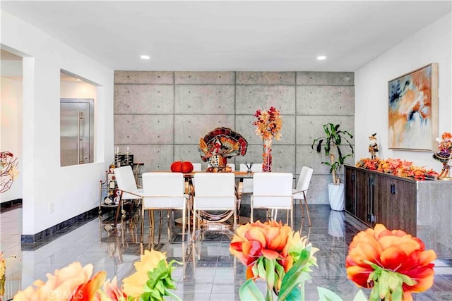 dining room featuring light tile patterned floors