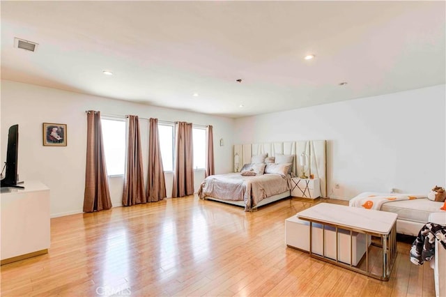 bedroom with light hardwood / wood-style floors