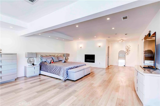 bedroom with light hardwood / wood-style floors