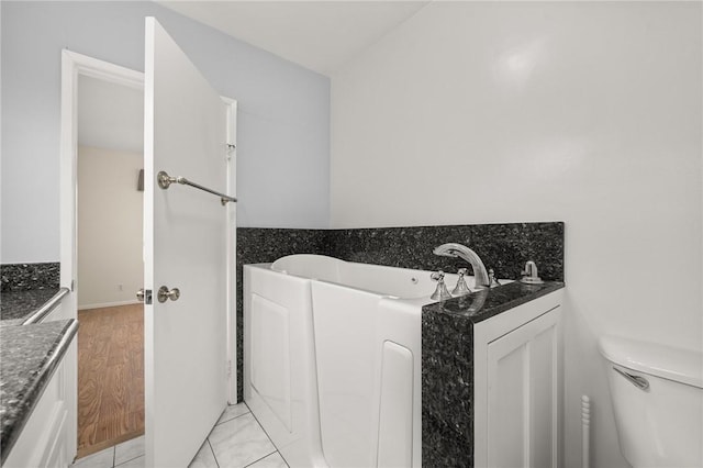 661 W 26th St, San Pedro, CA 90731 - full bathroom featuring a bath, toilet, and vanity