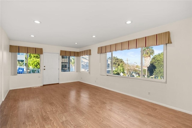661 W 26th St, San Pedro, CA 90731 - spare room featuring recessed lighting, baseboards, and wood finished floors