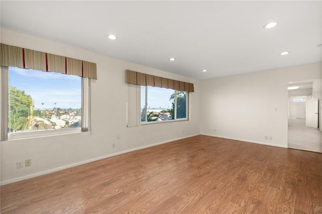 661 W 26th St, San Pedro, CA 90731 - spare room with recessed lighting, light wood finished floors, and baseboards