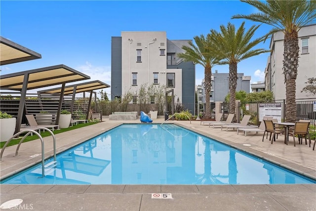 view of swimming pool featuring a patio