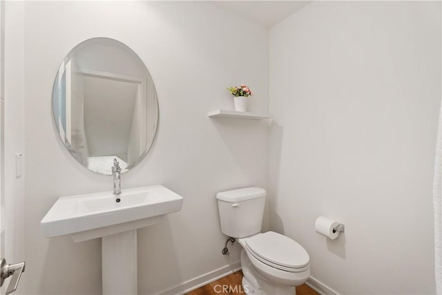 bathroom featuring toilet