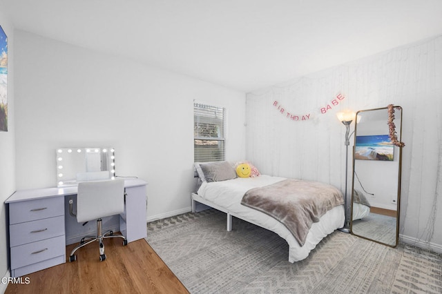 bedroom with light hardwood / wood-style floors