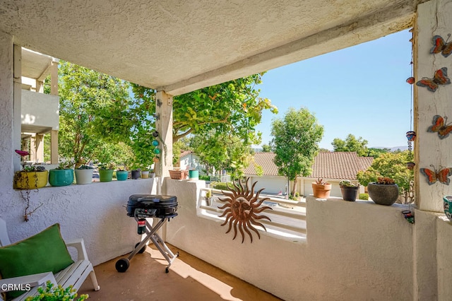 view of patio / terrace with a balcony