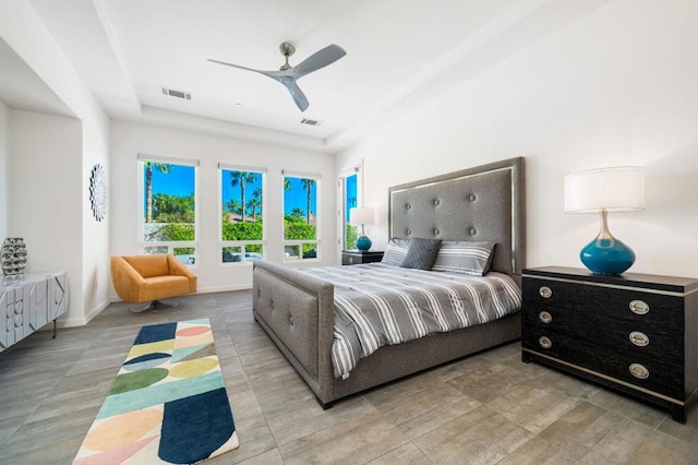 bedroom featuring light hardwood / wood-style floors and ceiling fan