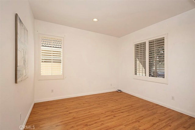 empty room with light wood-type flooring