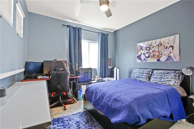 carpeted bedroom featuring ceiling fan