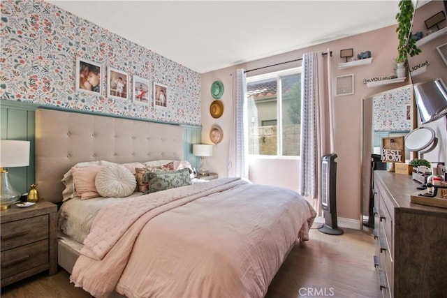 bedroom featuring hardwood / wood-style floors