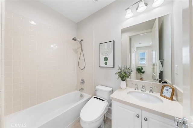 full bathroom with tiled shower / bath combo, toilet, and vanity