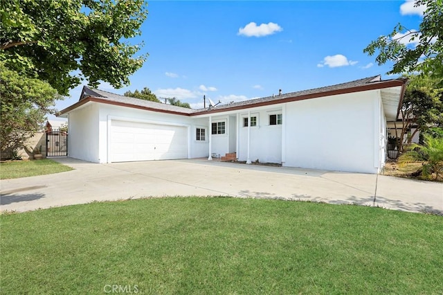 single story home featuring a front yard and a garage