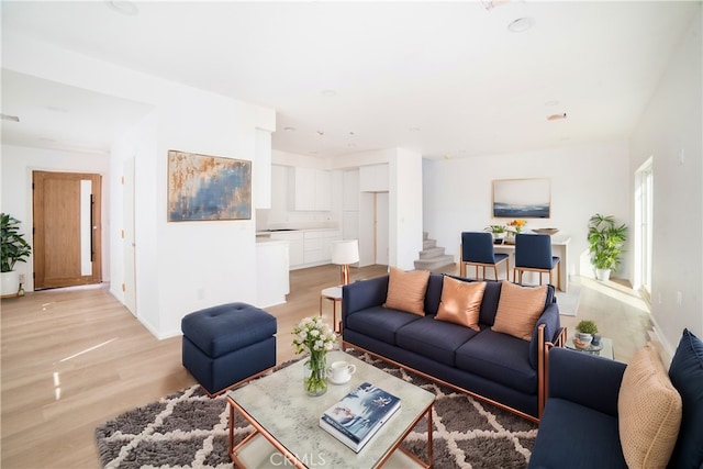 living room with light hardwood / wood-style floors