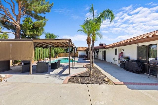 view of swimming pool with a patio