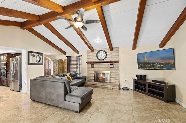 living room with ceiling fan, lofted ceiling with beams, and a brick fireplace