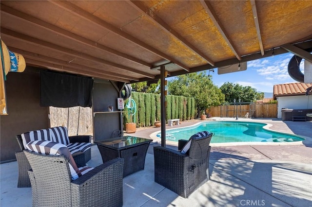 view of pool featuring a patio area