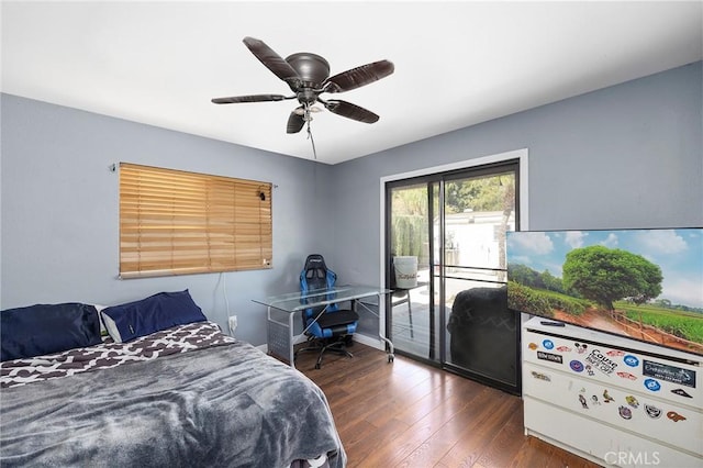 bedroom featuring access to exterior, ceiling fan, and dark wood-type flooring