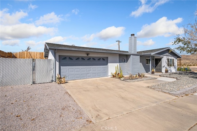 single story home featuring a garage